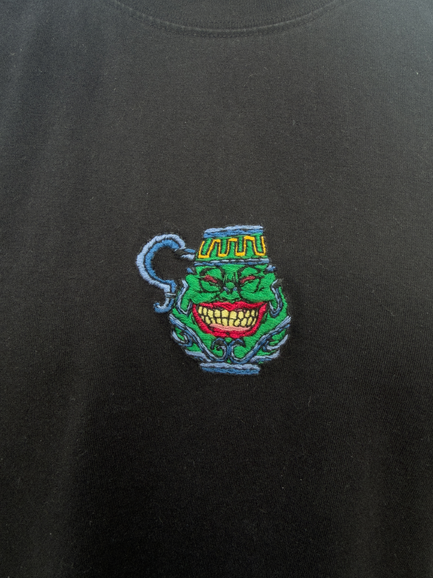 Pot of Greed — Embroidery detail